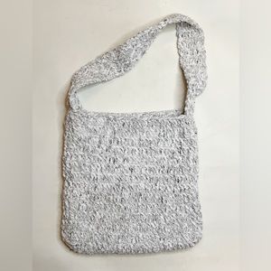 #61 White and black blanket bag. Red button.